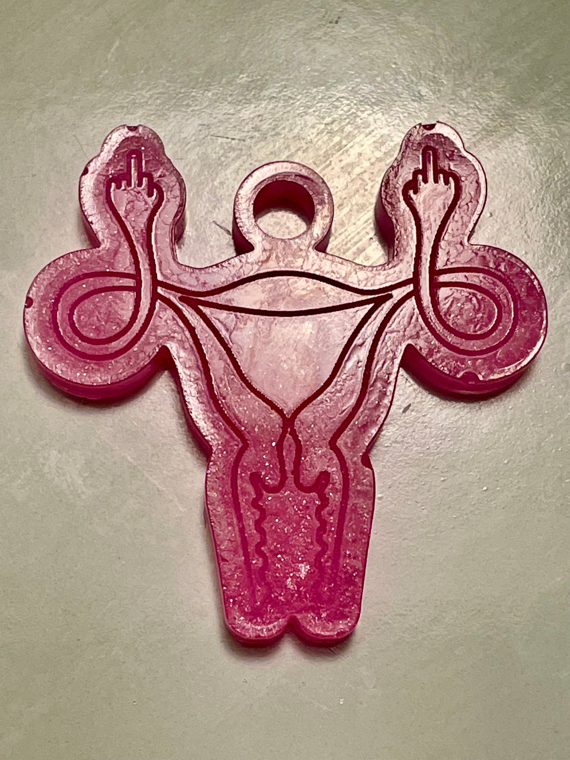 angry uterus keychain