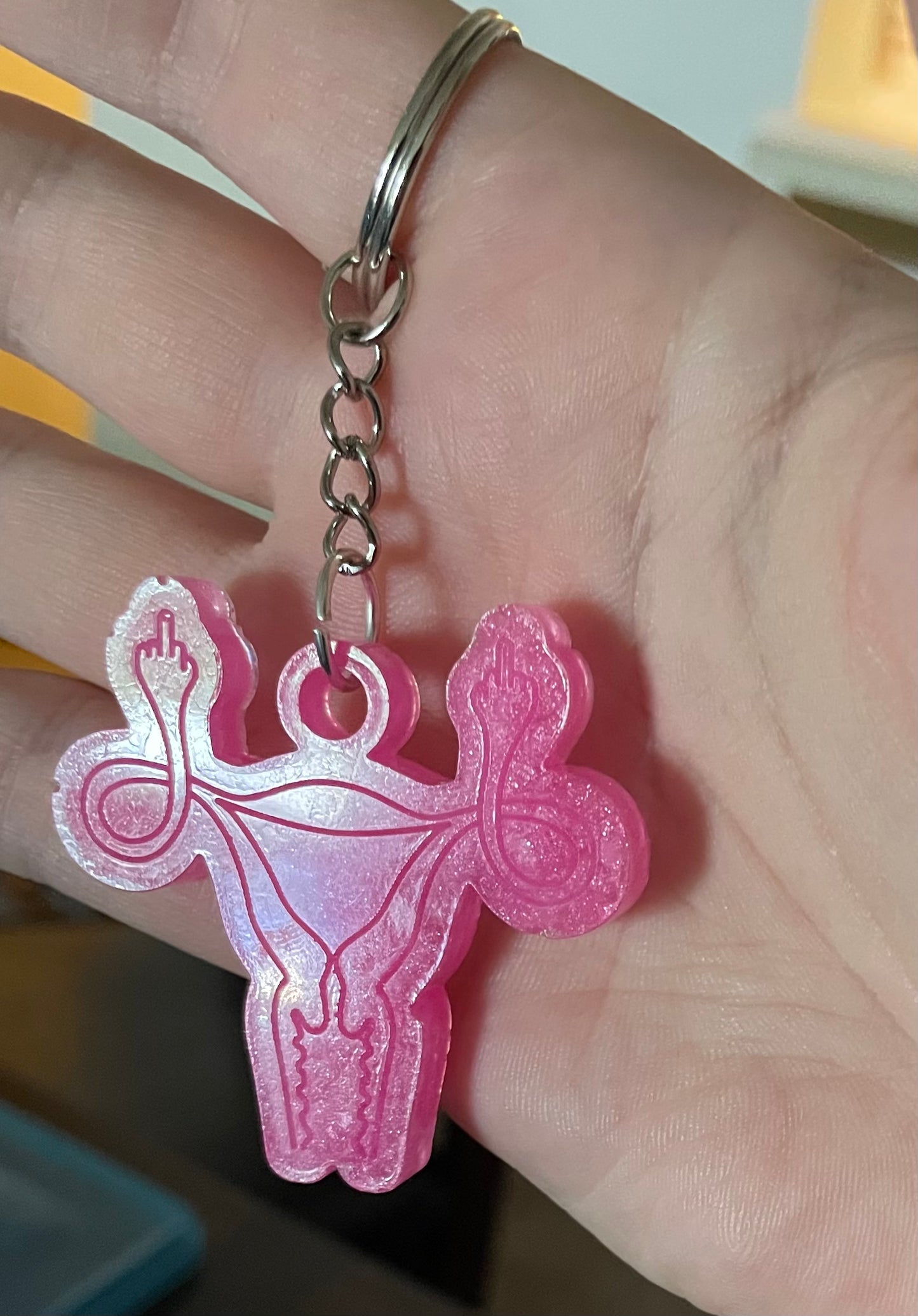 Angry Uterus Keychain in hand