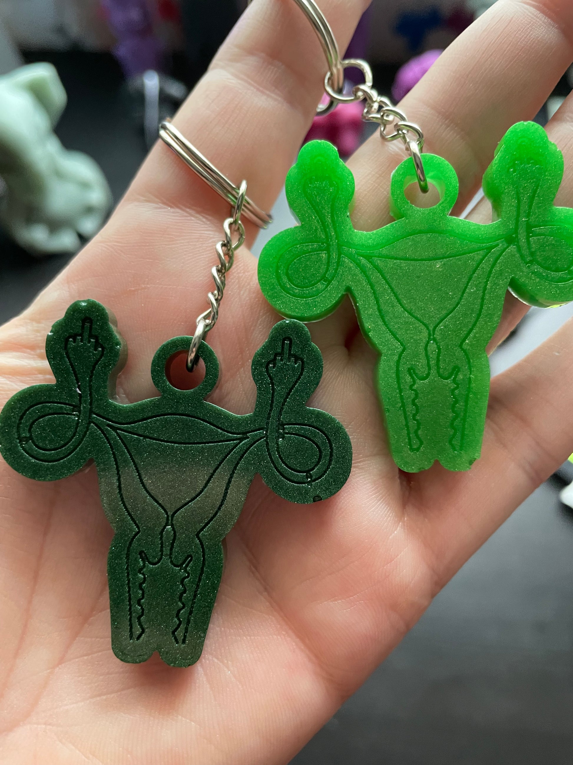 Hunter Green and Green uterus keychains